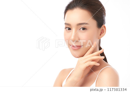 Beautiful young asian woman with clean fresh skin on white background, Face care, Facial treatment, Cosmetology, beauty and spa, Asian women portrait. Beautiful young asian woman with clean fresh skin on white background, Face care, Facial treatment, Cosmetology, beauty and spa, Asian women portrait. 117381334