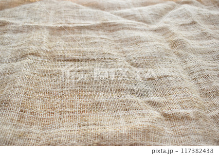 brown sackcloth texture background, crumpled burlap fabric textile for design 117382438