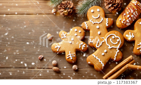 Christmas gingerbread cookies on wooden table background 117383367