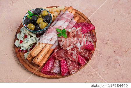 Appetizer, assortment, set, sausage, and cheese, on a wooden board, top view, no people, Appetizer, assortment, set, sausage, and cheese, on a wooden board, top view, no people, 117384449