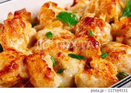 baked cauliflower, in cream sauce, with cheese and spices, homemade, no people, 117384531
