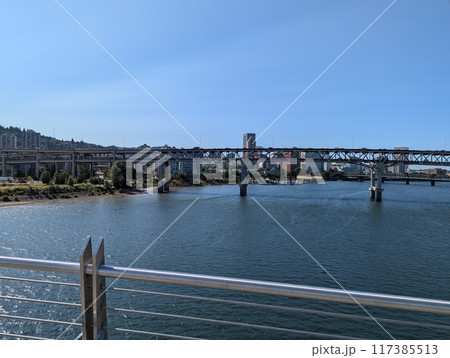 Portland, Oregon, USA - 07.11.2024 View from the Ross Island Bridge to the Marquam Bridge and the city. 117385513