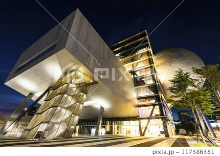 Building view of the Taipei Performing Arts Center in Taiwan. it's a modern building combining cube and sphere geometry. Building view of the Taipei Performing Arts Center in Taiwan. it's a modern building combining cube and sphere geometry. 117386381