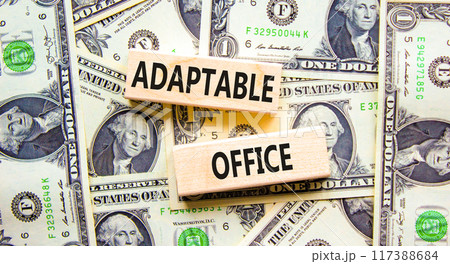 Adaptable office symbol. Concept words Adaptable office on beautiful wooden block. Beautiful dollar bills background. Dollar bills. Business Adaptable office concept. Copy space. 117388684