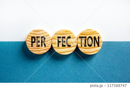 Perfection symbol. Concept word Perfection on beautiful wooden circles. Beautiful blue white background. Business perfection concept. Copy space. 117388747