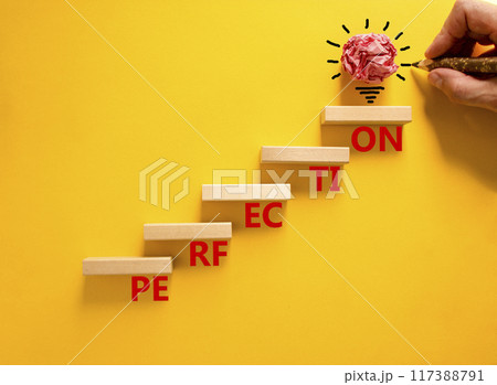 Perfection symbol. Concept word Perfection on beautiful wooden blocks. Beautiful yellow background. Businessman hand. Beautiful light bulb icon. Business perfection concept. Copy space. Perfection symbol. Concept word Perfection on beautiful wooden blocks. Beautiful yellow background. Businessman hand. Beautiful light bulb icon. Business perfection concept. Copy space. 117388791