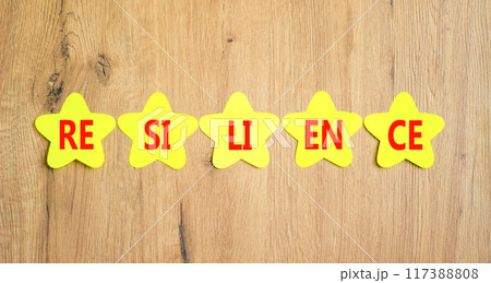 Resilience symbol. Concept word Resilience on beautiful yellow paper stars. Beautiful wooden background. Business resilience concept. Copy space. Resilience symbol. Concept word Resilience on beautiful yellow paper stars. Beautiful wooden background. Business resilience concept. Copy space. 117388808