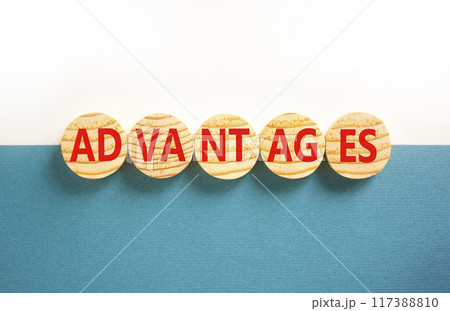 Advantages symbol. Concept word Advantages on beautiful wooden circles. Beautiful white and blue background. Business advantages concept. Copy space. 117388810