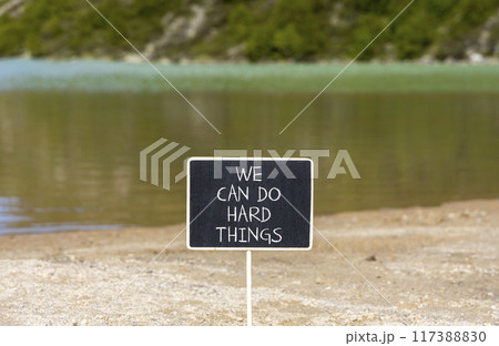 We can do hard things symbol. Concept words We can do hard things on beautiful blackboard. Beautiful mountain lake background. Business, motivation we can do hard things concept. Copy space. We can do hard things symbol. Concept words We can do hard things on beautiful blackboard. Beautiful mountain lake background. Business, motivation we can do hard things concept. Copy space. 117388830