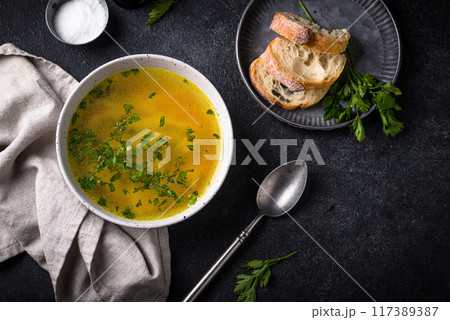Chicken broth with parsley, healthy food 117389387