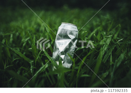 Recycle concept, plastic water bottles on the lawn Recycle concept, plastic water bottles on the lawn 117392335