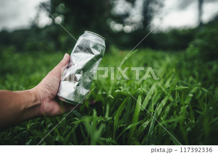 Recycle concept, plastic water bottles on the lawn Recycle concept, plastic water bottles on the lawn 117392336