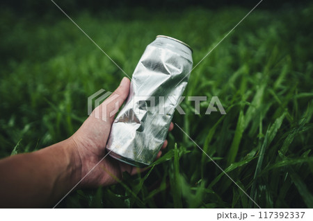 Recycle concept, plastic water bottles on the lawn Recycle concept, plastic water bottles on the lawn 117392337