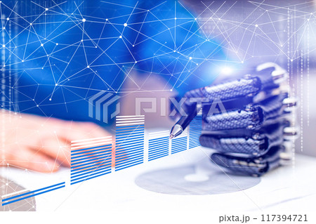 A person is writing with a pen on a piece of paper 117394721