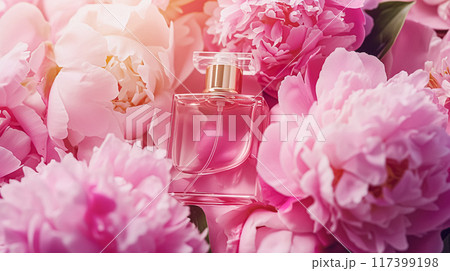 Perfume bottle with beautiful flowers. Floral background. Beauty concept. Flat lay, top view. 117399198