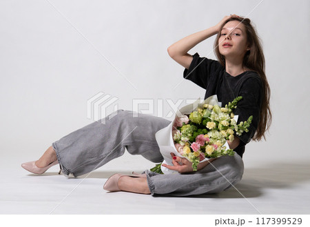 beautiful girl jeans bouquet natural model white day fashion smile hair happy fresh romantic female beautiful girl jeans bouquet natural model white day fashion smile hair happy fresh romantic female 117399529
