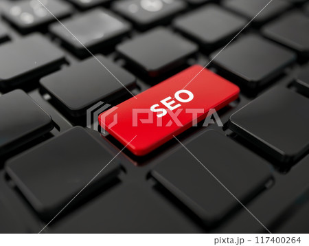 Close-up of a black keyboard with a red "SEO" key, symbolizing search engine optimization 117400264