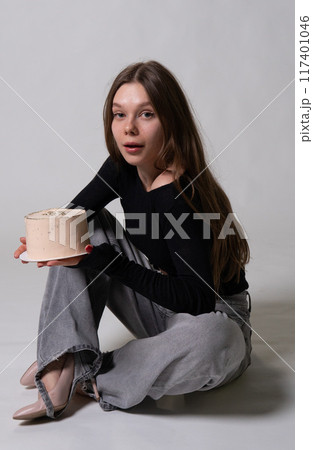 jeans hair day model natural smile cake bouquet girl fresh fashion female white happy beautiful 117401046