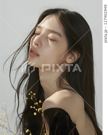 柔らかな光を纏う、ミステリアスなアジア人女性 117402949