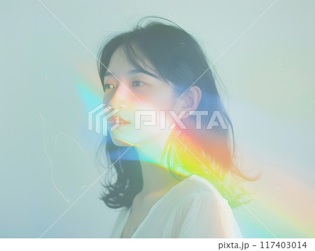 虹色の光を纏うアジア人女性 117403014