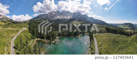 Experience a breathtaking aerial view showcasing the Photography Karersee, Carezza lake, is a lake in the Dolomites in South Tyrol, Italy Experience a breathtaking aerial view showcasing the Photography Karersee, Carezza lake, is a lake in the Dolomites in South Tyrol, Italy 117403641