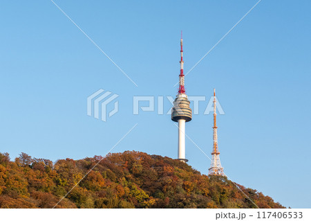 N Seoul Tower with autumn landscape. It is also known as Namsan Tower or Seoul Tower, the landmark which is a communication and observation tower located on Nam Mountain in central Seoul, South Korea 117406533