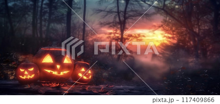 Glowing Jack-o'-Lanterns in Forest at Sunset 117409866