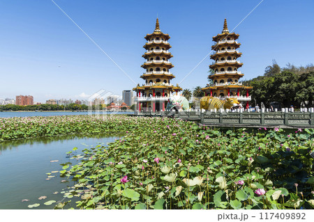 View of the lotus in bloom at the Dragon and Tiger Pagoda in Lotus Pond, Kaohsiung, Taiwan. 117409892