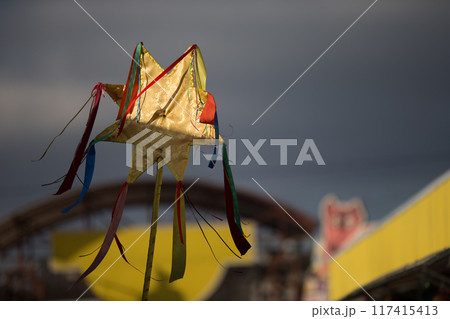 Christmas eight-pointed star decorated with colorful ribbons Christmas eight-pointed star decorated with colorful ribbons 117415413