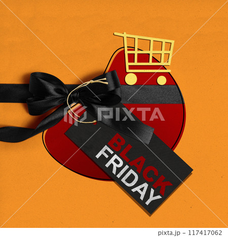 A black friday sign is on a red background 117417062
