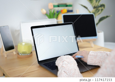 asian woman use laptop and internet for conference online and work from home asian woman use laptop and internet for conference online and work from home 117417153