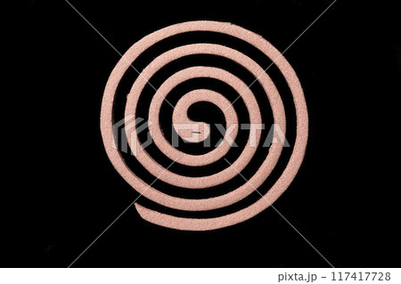 Mosquito coils on black background 117417728