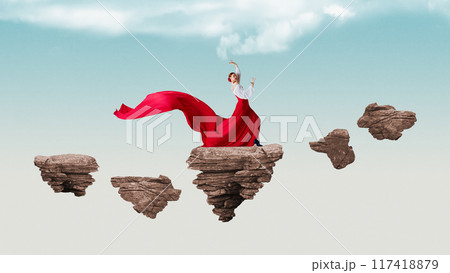 Elegant young woman in flowing red dress dancing Flamenco atop floating rocks, against open sky. Pure, weightless elegance. Contemporary art collage. Elegant young woman in flowing red dress dancing Flamenco atop floating rocks, against open sky. Pure, weightless elegance. Contemporary art collage. 117418879