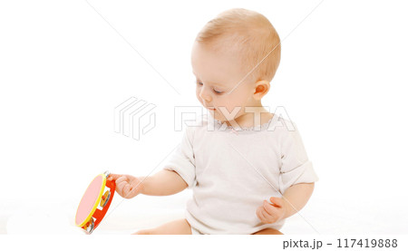 Happy little baby playing with toys sitting on white background Happy little baby playing with toys sitting on white background 117419888