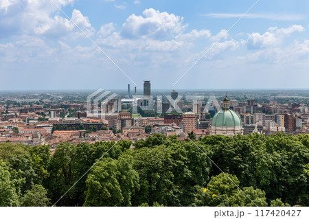 Brescia Duomo dome over historic rooftops with business district Brescia Duomo dome over historic rooftops with business district 117420427