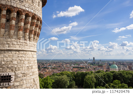 View from Brescia Castle in Italy over the old town featuring the Duomo dome and business district 117420476