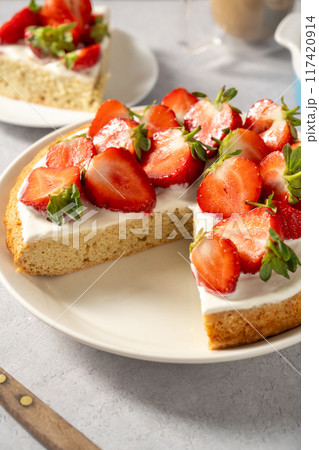 Sponge cake with fresh strawberries, copy space Sponge cake with fresh strawberries, copy space 117420914
