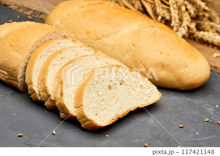 Freshly baked white bread loaf, sliced and ready to serve, perfect for sandwiches and breakfast Freshly baked white bread loaf, sliced and ready to serve, perfect for sandwiches and breakfast 117421148