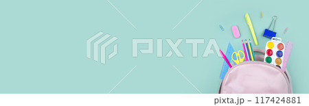 Back to school concept. School supplies are collected in a backpack. Pastel colors banner copy space Back to school concept. School supplies are collected in a backpack. Pastel colors banner copy space 117424881