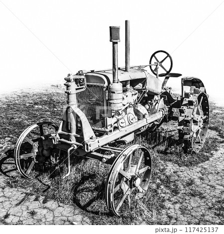 Old disused tractor 117425137