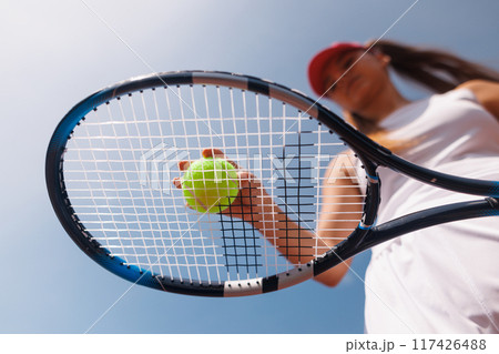 young woman playing tennis on the tennis court, olympic sport young woman playing tennis on the tennis court, olympic sport 117426488