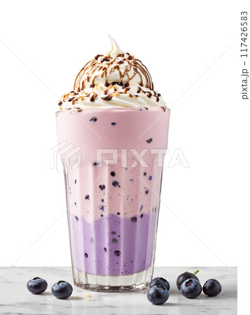 Montana Huckleberry Milkshake Bar Tall glass with ice cream milk huckleberries and various toppings served 117426583
