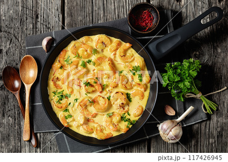 Sauteed Shrimp in creamy saffron sauce, top view Sauteed Shrimp in creamy saffron sauce, top view 117426945