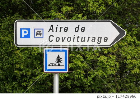Carpool point and parking road sign in France Carpool point and parking road sign in France 117428966