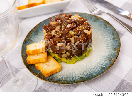 Tuna tartare appetizer served on platter Tuna tartare appetizer served on platter 117434365