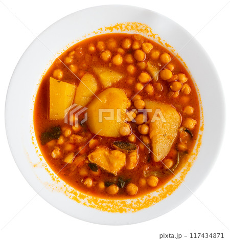 Chickpea stew served with cod fish 117434871