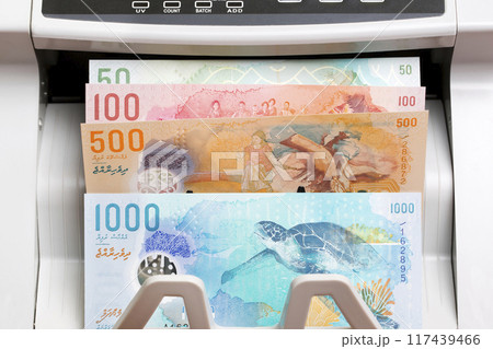 Maldivian rufiyaa in the counting machine 117439466