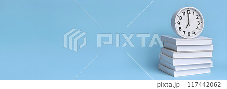 clock and books, banner format. generative AI 117442062