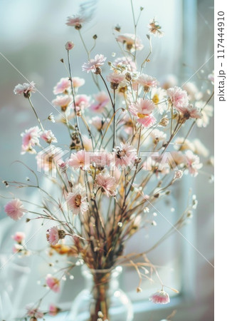 Sunlit Vintage Glass Vase with Dried Flowers by Window 117444910
