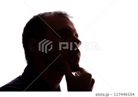 Thoughtful young unshaven man, business clothes, silhouette - white background isolate 117446104